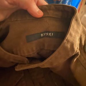 It’s a size 36 15 1/2 in mens brown with Gucci symbol on the shoulder
